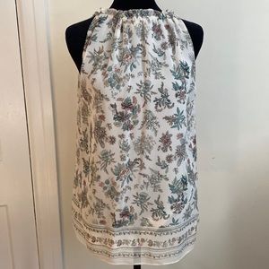 Cute Spring sleeveless tank. Shear fabric w light lining. Beautiful design!